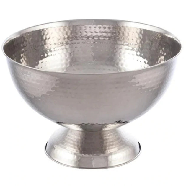Silver footed bowl with a textured surface on a white background